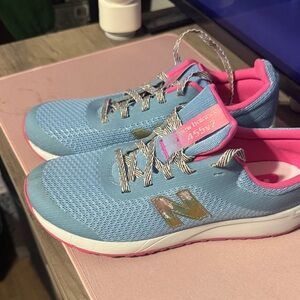 Gently use once Balance Kids' Sneakers in Blue and Pink